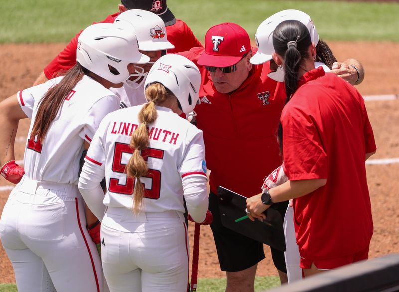 Texas Tech head coach Gerry Glasco talks to his players during a game in the Lubbock Regional of the 2025 NCAA softball tournament, Saturday, May 17, 2025, at Rocky Johnson Field.