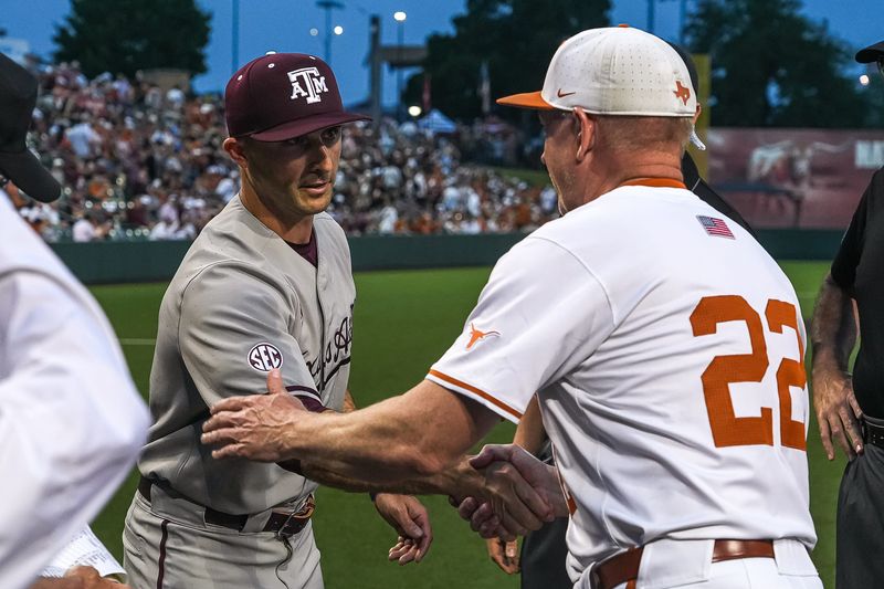 Texas A&M head coach Michael Earley meets Texas Longhorns head coach Jim Schlossnagle ahead of the Lone Star Showdown at UFCU Disch-Falk Field on Friday, April 25, 2025.