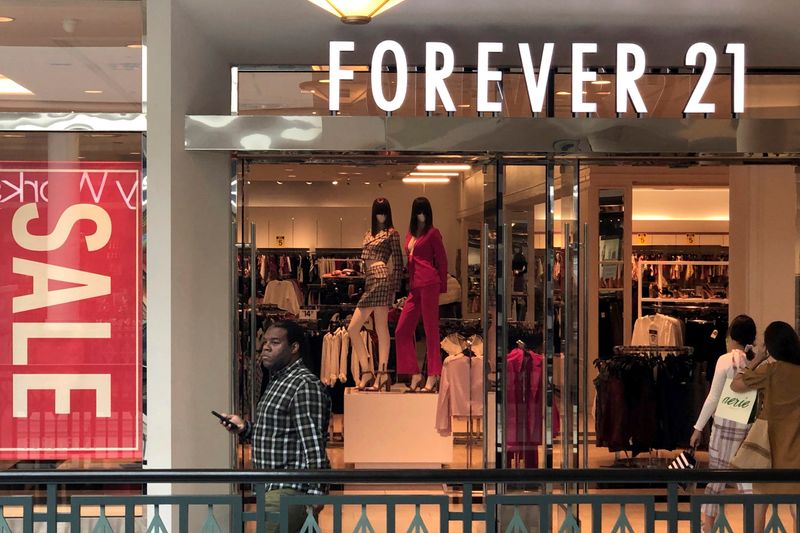 FILE PHOTO: Shoppers enter a Forever 21 fashion retail store at the King of Prussia mall in King of Prussia, Pennsylvania