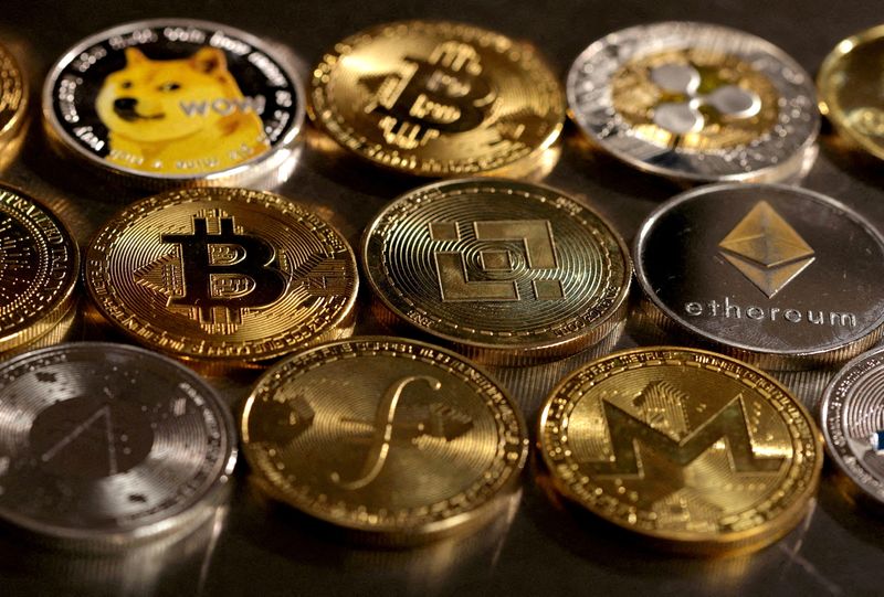 FILE PHOTO: Illustration shows representations of cryptocurrencies
