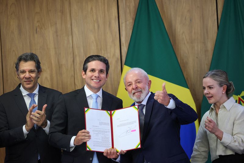 Brazil’s President Luiz Inacio Lula da Silva holds a meeting to announce the submission of a bill to expand income tax exemptions to the National Congress