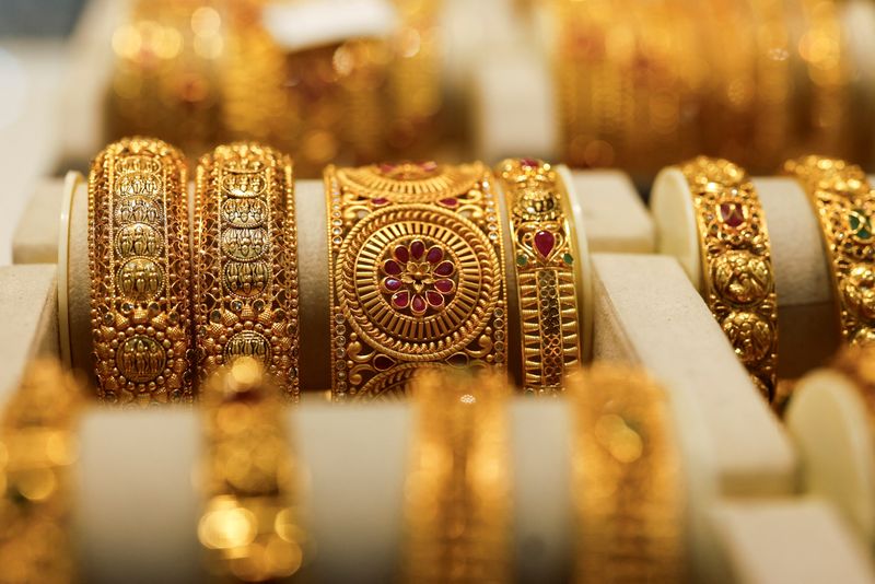 Gold bangles are displayed at a jewellery store in Mumbai, India, March 20, 2025. REUTERS/Francis Mascarenhas