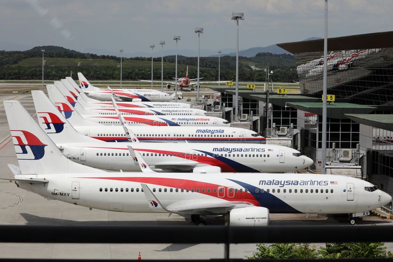 FILE PHOTO: Malaysia Airlines planes are seen parked at Kuala Lumpur International Airport in Sepang, Malaysia October 6, 2020. REUTERS/Lim Huey Teng/File Photo