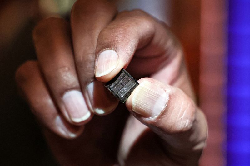 FILE PHOTO: A Micron Technology chip on display in New York City, U.S., April 26, 2024. REUTERS/Brendan McDermid/File Photo