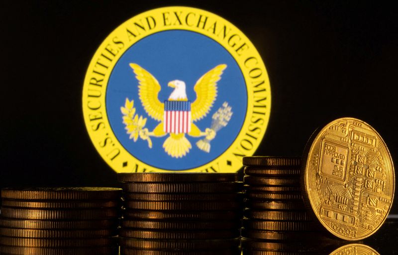 FILE PHOTO: U.S. Securities and Exchange Commission logo and representations of cryptocurrency are seen in this illustration taken June 6, 2023. REUTERS/Dado Ruvic/Illustration/File Photo