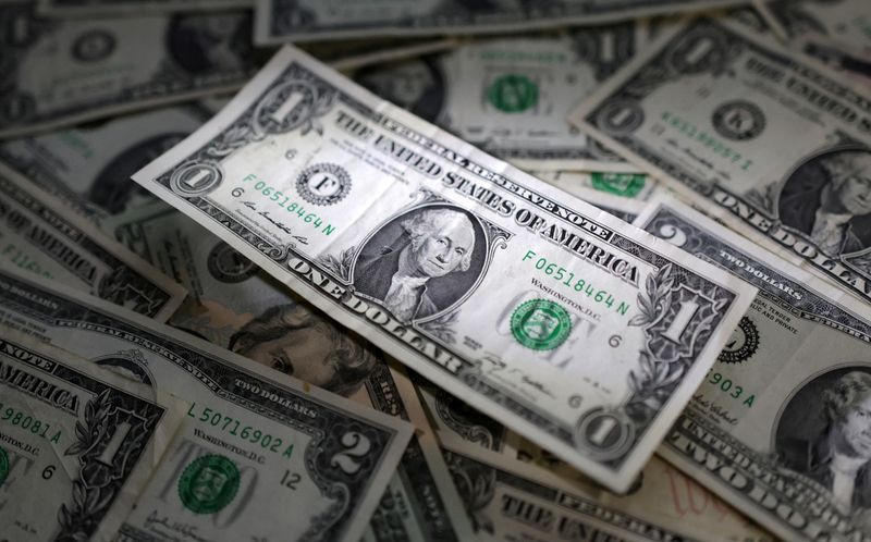 FILE PHOTO: U.S. dollar banknotes are seen in this illustration taken March 10, 2023. REUTERS/Dado Ruvic/Illustration/File Photo