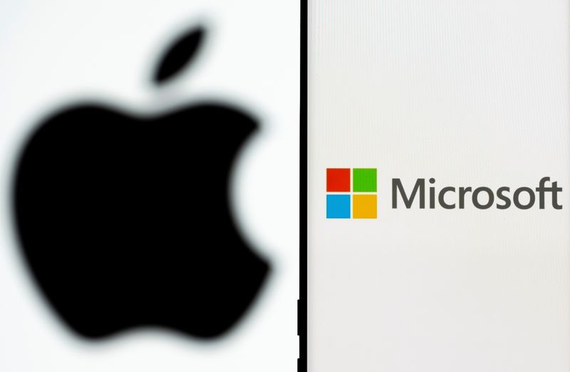 FILE PHOTO: Microsoft logo is seen on the smartphone in front of displayed Apple logo in this illustration taken, July 26, 2021. REUTERS/Dado Ruvic/Illustration/File Photo