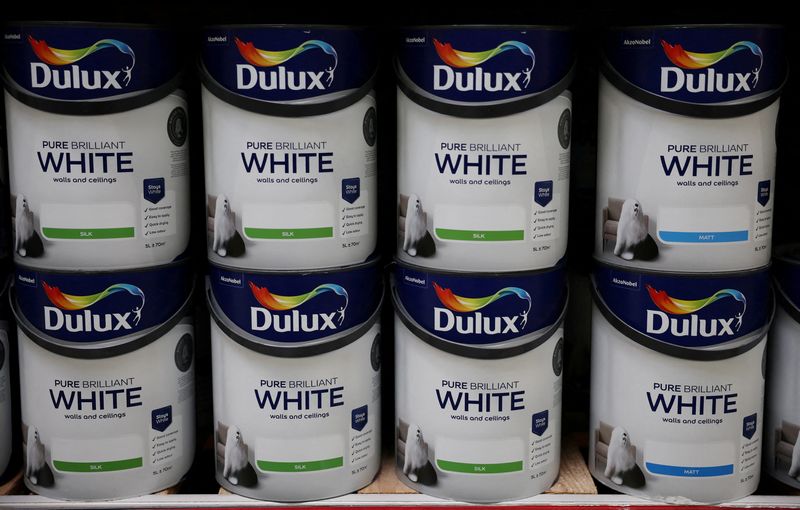 FILE PHOTO: Cans of Dulux paint, an AkzoNobel brand, are seen on the shelf of a DIY retail store in Manchester, Britain, June 14, 2024. REUTERS/Phil Noble/File Photo