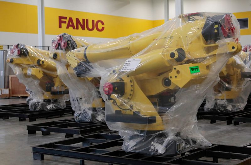 FILE PHOTO: An inventory of manufacturing robots, waiting to be shipped to customers, are seen in a FANUC American facility in Auburn Hills, Michigan, U.S.  August 11, 2021. Picture taken August 11, 2021.   REUTERS/Rebecca Cook/File photo