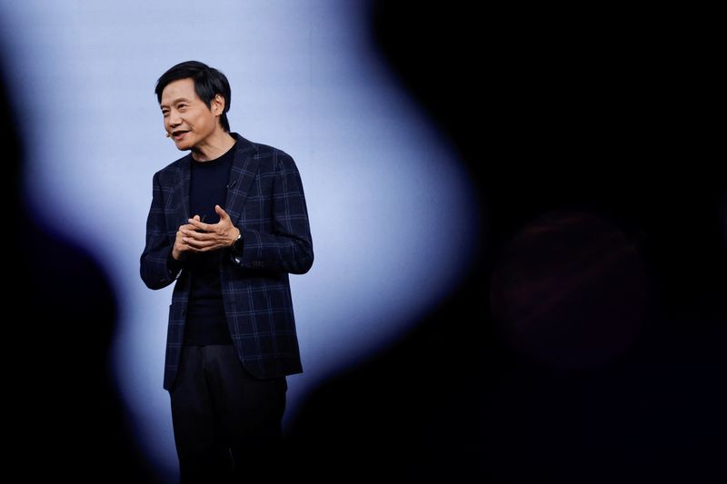 FILE PHOTO: Xiaomi founder and CEO Lei Jun speaks during an event in Beijing, China October 29, 2024. REUTERS/Tingshu Wang/File photo