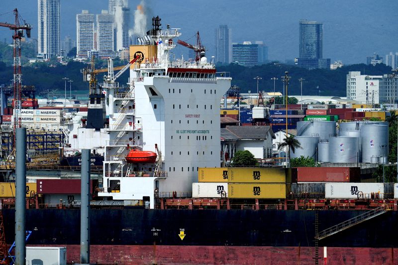 FILE PHOTO: A ship sails near the Balboa Port in Panama City, Panama, March 4, 2025. REUTERS/Enea Lebrun/File Photo