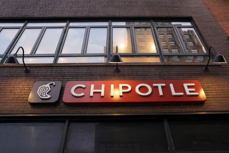 FILE PHOTO: An exterior view of Chipotle in SoHo in New York City, U.S., October 4, 2024. REUTERS/Kent J. Edwards/File Photo