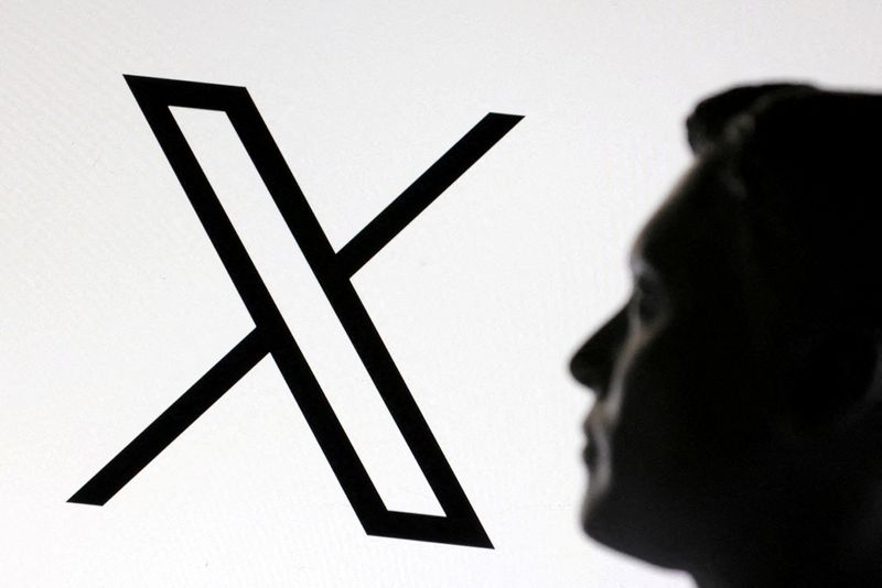 FILE PHOTO: A 3D-printed miniature model of Elon Musk and the X logo are seen in this illustration taken January 23, 2025. REUTERS/Dado Ruvic/Illustration/File Photo