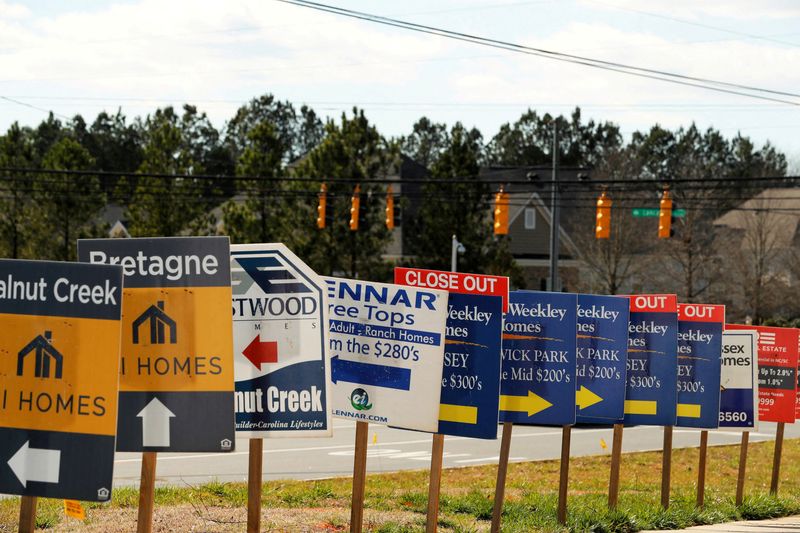 FILE PHOTO: Real estate signs advertise new homes for sale in multiple new developments in York County, South Carolina, U.S., February 29, 2020. REUTERS/Lucas Jackson/File Photo