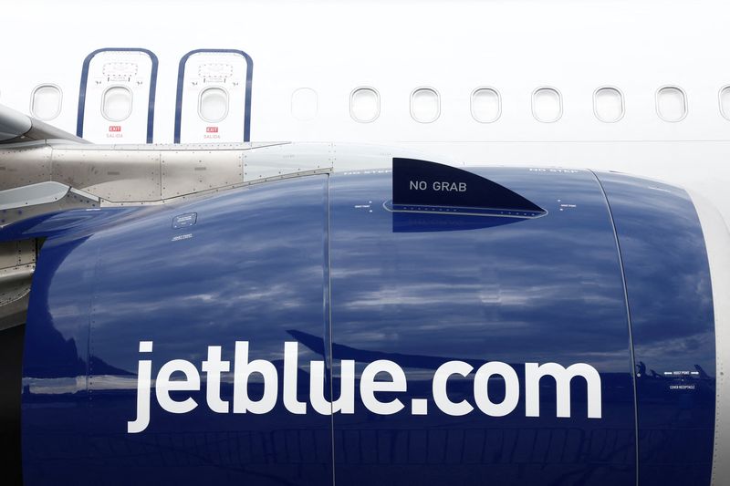 FILE PHOTO: JetBlue logo is seen on an Airbus A321LR at the 54th International Paris Airshow at Le Bourget Airport near Paris, France, June 20, 2023. REUTERS/Benoit Tessier/File photo