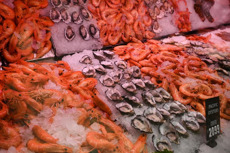FILE PHOTO: Seafood is seen for sale at a fish market in Sydney, Australia, June 17, 2020.  REUTERS/Loren Elliott/File Photo