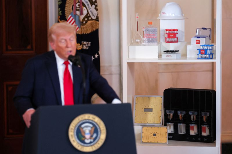 FILE PHOTO: U.S. President Donald Trump delivers remarks near Johnson & Johnson and Lilly branded items at an "Investing in America" event in Washington, U.S., April 30, 2025. REUTERS/Leah Millis/File Photo