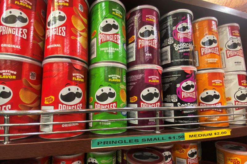 Cans of flavoured Pringles are seen on display at a store in New York City, U.S., August 5, 2024. REUTERS//Kent J. Edwards