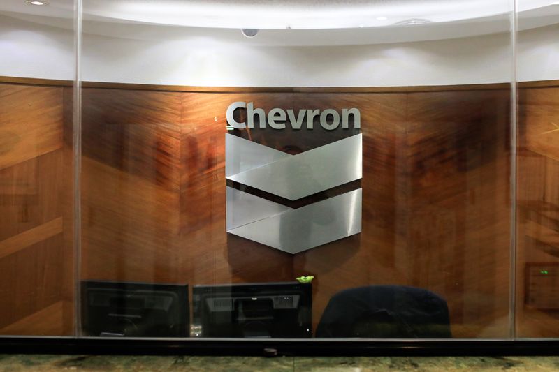 FILE PHOTO: The logo of Chevron is seen at the company's office in Caracas, Venezuela April 25, 2018. REUTERS/Marco Bello/ File Photo