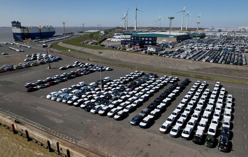 FILE PHOTO: Drone view shows Volkswagen Group cars bound for cargo ship export to the United States at the seaport of Emden near the estuary, where the River Ems flows into the North Sea, in Emden, Germany, April 2, 2025. REUTERS/Erol Dogrudogan/File Photo