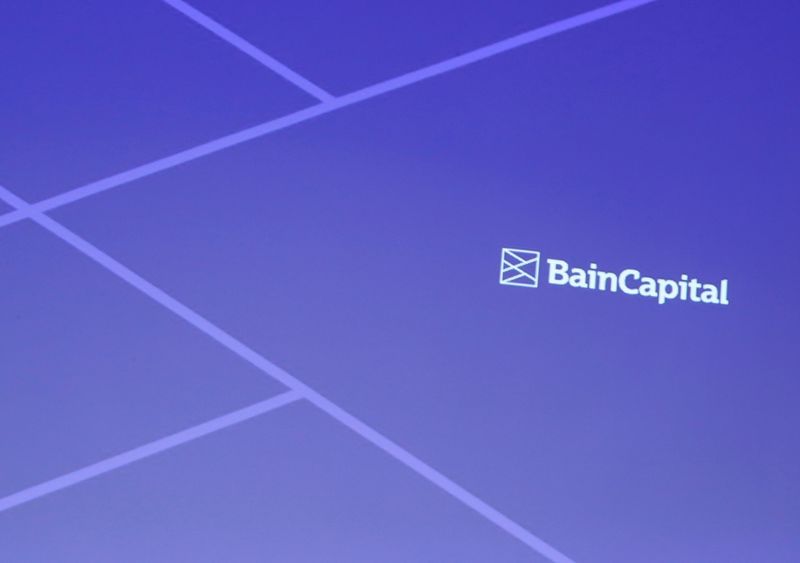 FILE PHOTO: Logo of Bain Capital is screened at a news conference in Tokyo, Japan September 28, 2017. REUTERS/Kim Kyung-Hoon/File Photo
