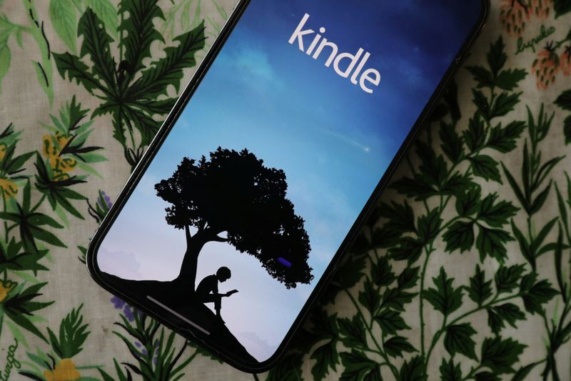 FILE PHOTO: Amazon's Kindle e-book app is seen on an iPhone in an illustration taken April 11, 2023. REUTERS/Chris Helgren/Illustration/File Photo