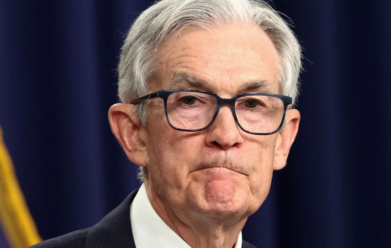 FILE PHOTO: U.S. Federal Reserve Chair Jerome Powell attends a press conference following a two-day meeting of the Federal Open Market Committee on interest rate policy in Washington, D.C., U.S., May 7, 2025. REUTERS/Kevin Lamarque/File Photo