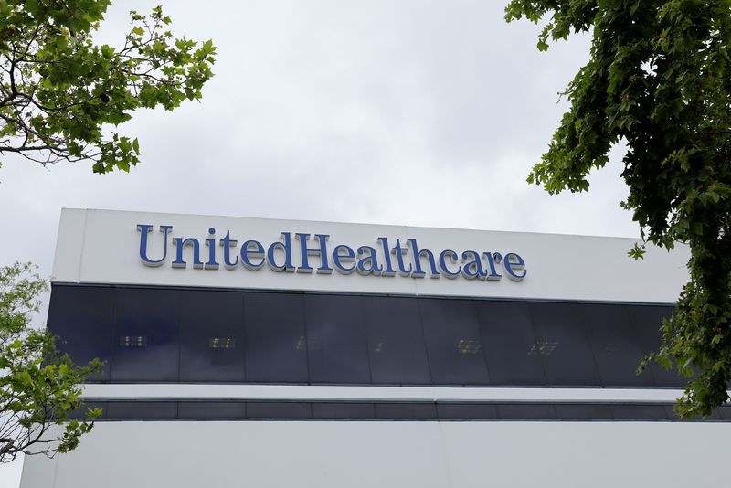 FILE PHOTO: The corporate logo of the UnitedHealth Group appears on the side of one of their office buildings in Santa Ana, California, U.S., April 13, 2020. REUTERS/Mike Blake/File Photo