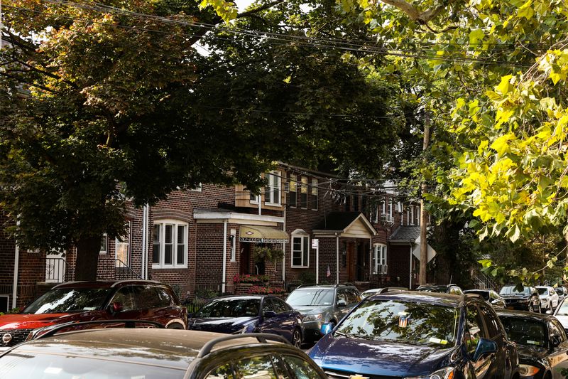 FILE PHOTO: A row of residential houses stands in Queens' neighborhood of Ridgewood, New York, U.S., September 16, 2022.  REUTERS/Amr Alfiky/File photo