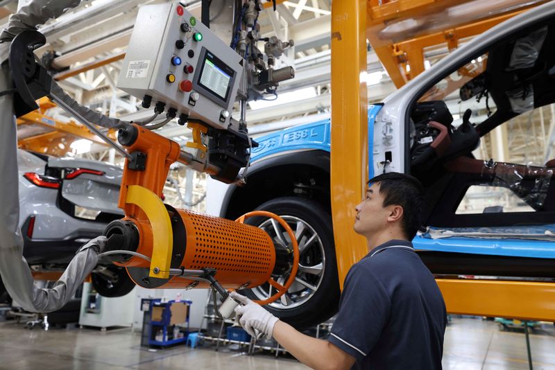 FILE PHOTO: Employee works on the production line of Nio electric vehicles in Hefei