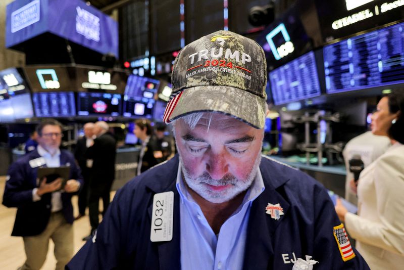 Trader wears a hat in support of Donald Trump at the New York Stock Exchange (NYSE)