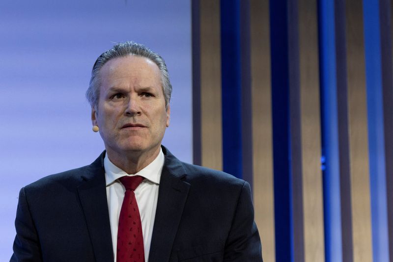 FILE PHOTO: Alaska Governor, Mike Dunleavy looks on during CERAWeek in Houston, Texas, U.S., March 14, 2025. REUTERS/Kaylee Greenlee/File photo