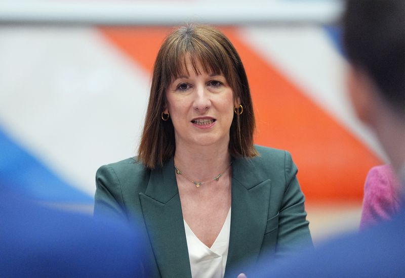 FILE PHOTO: Chancellor of the Exchequer Rachel Reeves hosting a roundtable with the defence sector at RAF Waddington in Lincolnshire. Picture date: Friday February 28, 2025. Yui Mok/Pool via REUTERS/File Photo