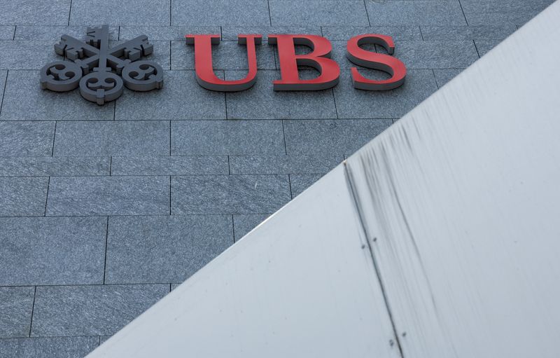 FILE PHOTO: A UBS logo is pictured on the branch of the Swiss bank in Lucerne, Switzerland, June 14, 2024.  REUTERS/Denis Balibouse/File Photo