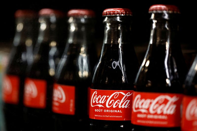 FILE PHOTO: Bottles of Coca-Cola are displayed on a shelf in a supermarket in Paris, France, January 29, 2025. REUTERS/Abdul Saboor/File Photo