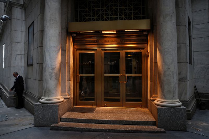 The Wall Street entrance to the New York Stock Exchange (NYSE) is seen in New York City, U.S., November 15, 2022. REUTERS/Brendan McDermid/File Photo