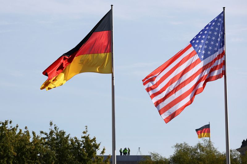FILE PHOTO: The U.S. and Germany flags flutter as German President Frank-Walter Steinmeier welcomes U.S. President Joe Biden at Bellevue Palace in Berlin, Germany, October 18, 2024. REUTERS/Fabrizio Bensch/File Photo