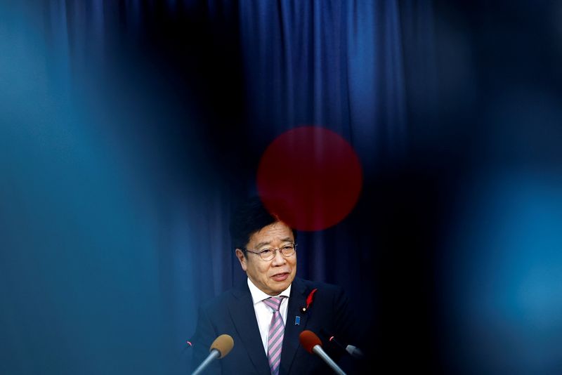 FILE PHOTO: Japan's Finance Minister Katsunobu Kato attends a press conference at the finance ministry in Tokyo, Japan October 2, 2024. REUTERS/Issei Kato/File Photo