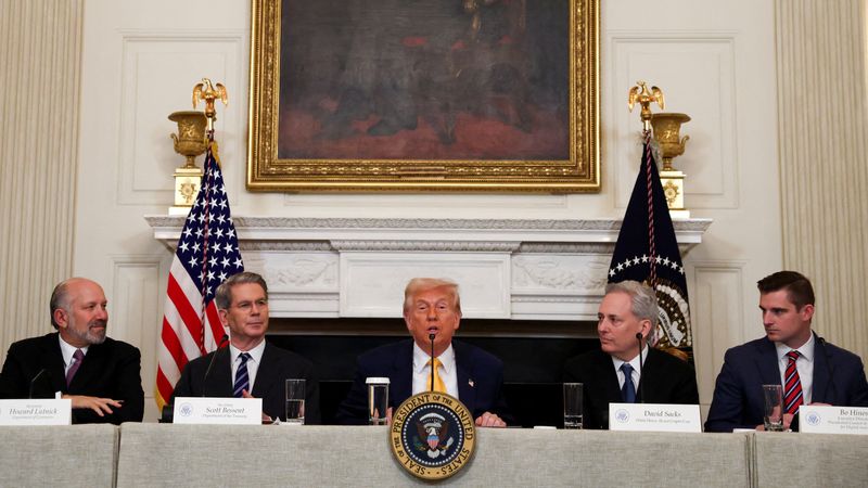 FILE PHOTO: U.S. President Donald Trump speaks as Crypto czar David Sacks, U.S. Treasury Secretary Scott Bessent, U.S. Commerce Secretary Howard Lutnick, and Executive Director of the Presidential Council of Advisers for Digital Assets Bo Hines attend the White House Crypto Summit at the White House in Washington, D.C., U.S.,  March 7, 2025. REUTERS/Evelyn Hockstein/File Photo