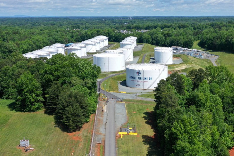 FILE PHOTO: Holding tanks are seen in an aerial photograph at Colonial Pipeline's Charlotte Tank Farm in Charlotte, North Carolina, U.S. May 10, 2021. REUTERS/Drone Base/File Photo