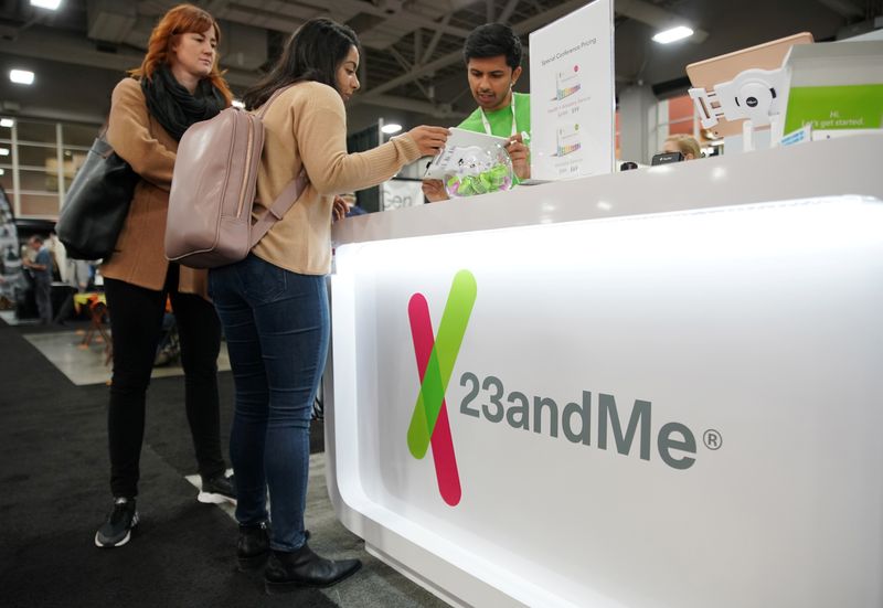 Attendees purchase DNA kits at the 23andMe booth at the RootsTech annual genealogical event in Salt Lake City, Utah, U.S., February 28, 2019.  REUTERS/George Frey/File Photo