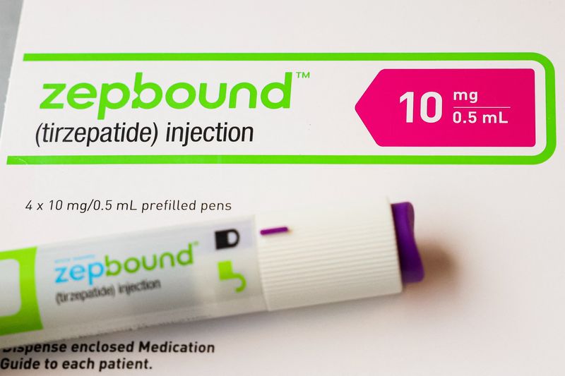 An injection pen of Zepbound, Eli Lilly’s weight loss drug, is displayed in New York City, U.S., December 11, 2023.  REUTERS/Brendan McDermid