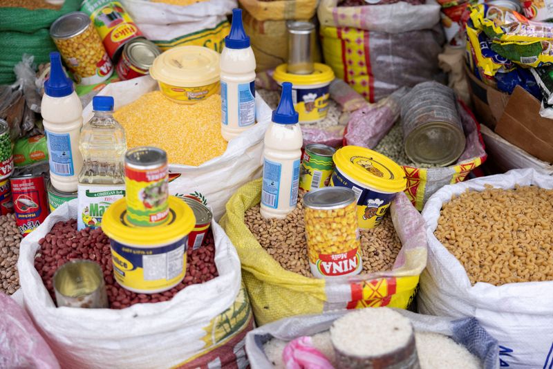 FILE PHOTO: Beans, grains, pasta and canned products are seen at the Petionville street market in Port-au-Prince, Haiti May 2, 2024. REUTERS/Ricardo Arduengo/File Photo