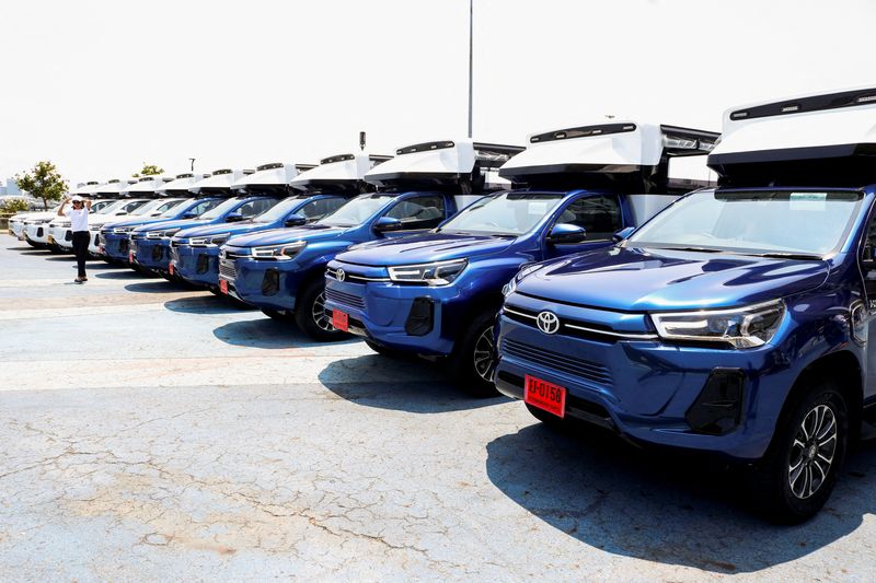 FILE PHOTO: Fully-electric Toyota Hilux Revo pickup trucks as public transportation vehicles are seen in the Thai seaside town of Pattaya, Chonburi province, Thailand, April 25, 2024. REUTERS/Artorn Pookasook/File Photo