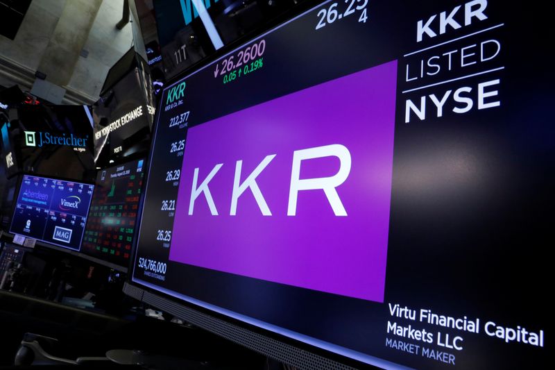 Trading information for KKR & Co is displayed on a screen on the floor of the New York Stock Exchange (NYSE) in New York, U.S., August 23, 2018. REUTERS/Brendan McDermid/File Photo