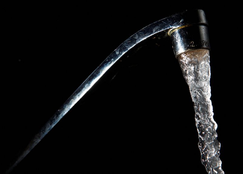 FILE PHOTO: Tap water comes out of a faucet in New York