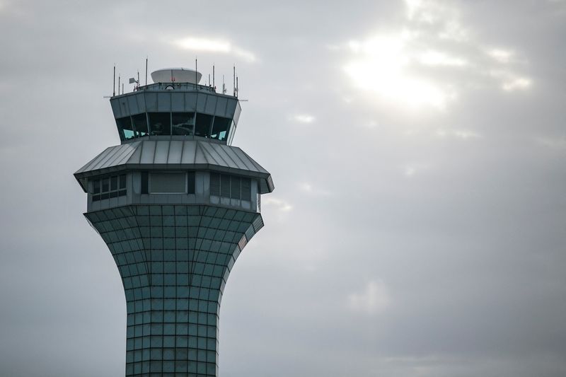 Passengers wait for the resumption of flights at O’Hare International Airport
