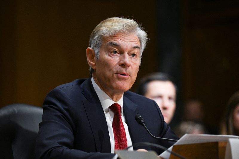 FILE PHOTO: Dr. Mehmet Oz, the celebrity physician nominated by U.S. President Donald Trump to be the administrator of the Centers for Medicare and Medicaid Services, testifies before a Senate Finance Committee confirmation hearing on Capitol Hill in Washington, D.C., U.S., March 14, 2025.