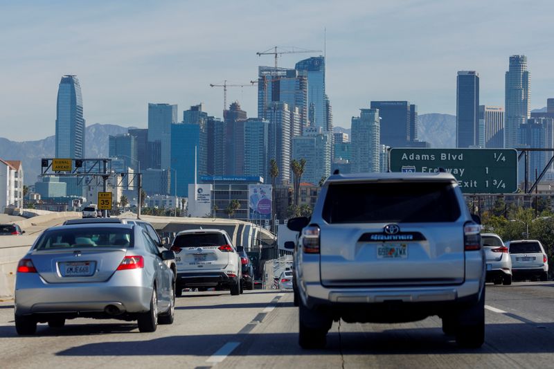 FILE PHOTO: Traffic moves along a freeway as vehicles travel towards Los Angeles, California, U.S., March 22, 2022.  REUTERS/Mike Blake/File Photo