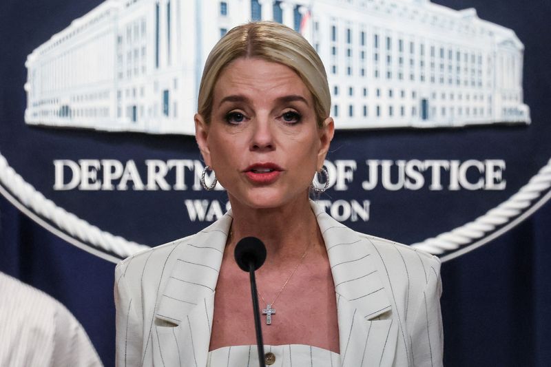 FILE PHOTO: U.S. Attorney General Pam Bondi attends a press conference, as she unveils actions against the state of Maine, which is locked in a dispute with the Trump administration over transgender policy, at the Justice Department in Washington, D.C., U.S., April 16, 2025. REUTERS/Leah Millis/File Photo